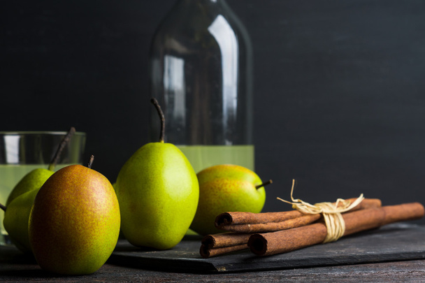 Fresh pears on wooden table - Фото, изображение