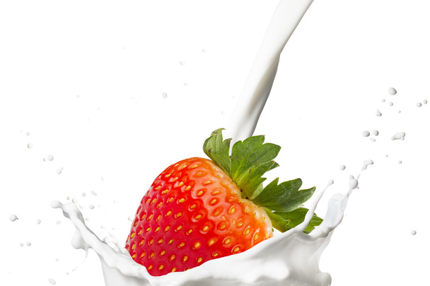 Strawberry Falling On Milk Splash - 写真・画像