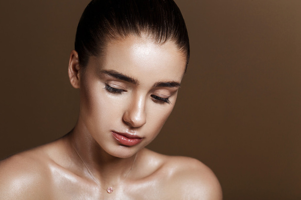 Strobing or Highlighting makeup. Closeup portrait of beautiful g - Valokuva, kuva