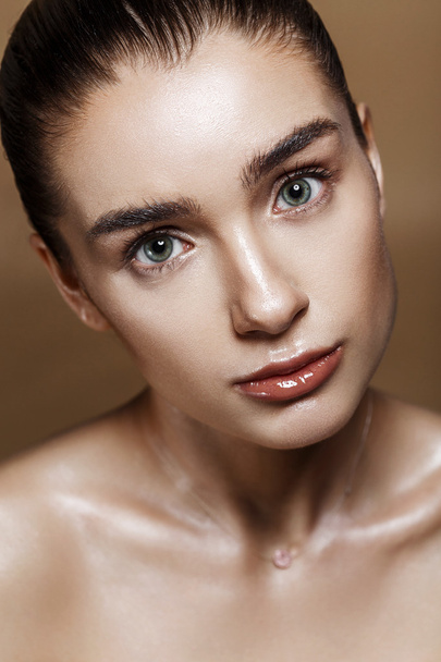 Strobing or Highlighting makeup. Closeup portrait of beautiful g - Zdjęcie, obraz