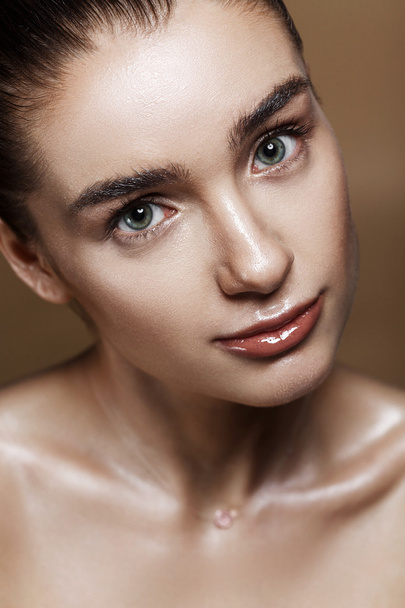 Strobing or Highlighting makeup. Closeup portrait of beautiful g - Φωτογραφία, εικόνα