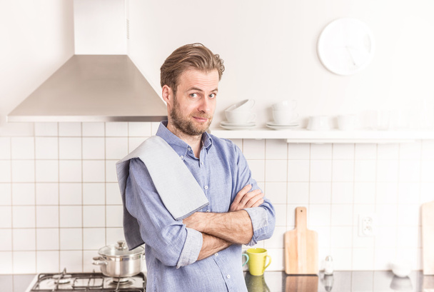 Forty years old caucasian man or chef in the kitchen - Photo, Image