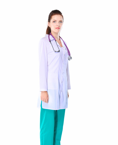 Smiling female doctor  in uniform standing at hospital - 写真・画像