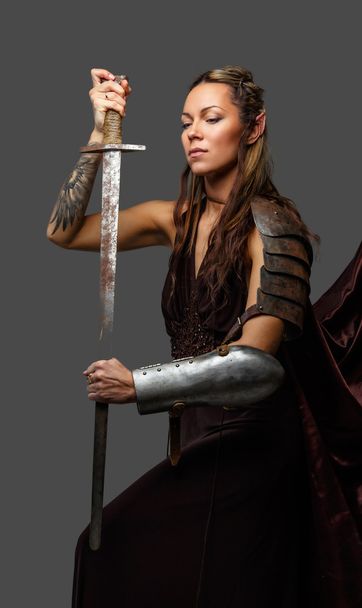 Fantastic woman warrior with sword - Foto, imagen