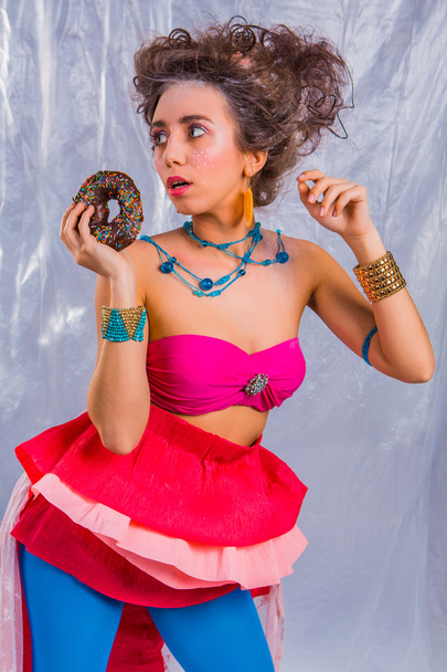 Beautiful  girl with colorful donut - Fotoğraf, Görsel
