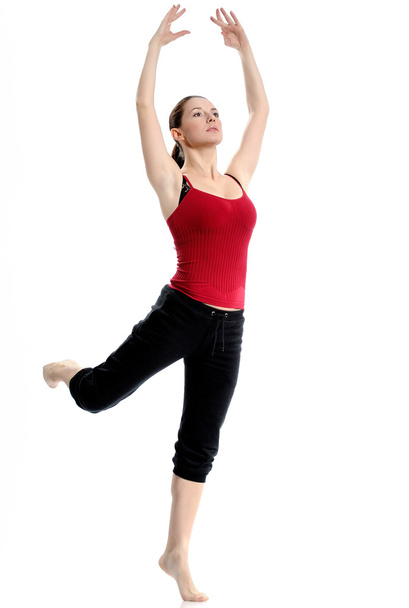 Girl in sportswear doing sport exercises - Photo, image
