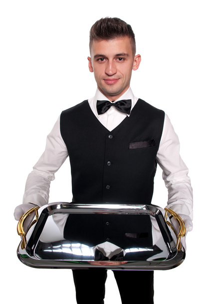 Un joven camarero con una bandeja
 - Foto, Imagen