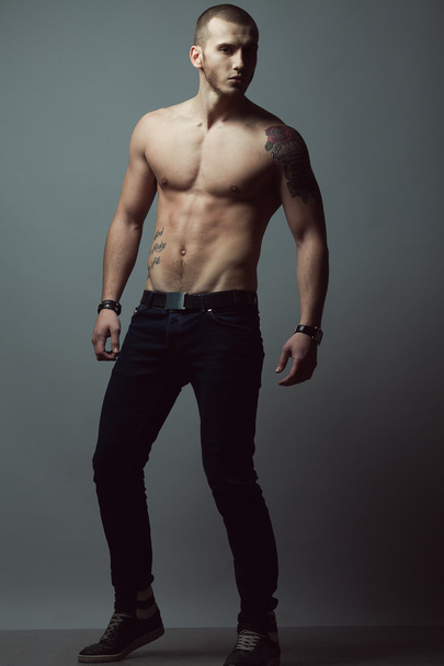 Bodybuilding, body sculpture concept. Male model with perfect body - Valokuva, kuva
