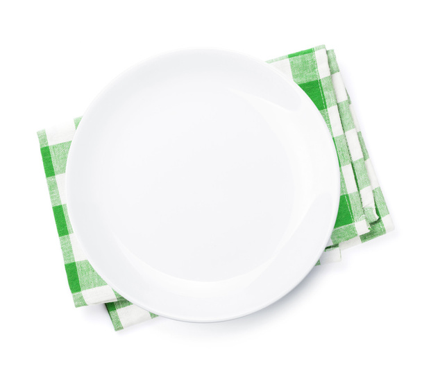 leerer Teller über Küchentuch - Foto, Bild