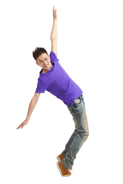 Full length of stylish young man dancing - Фото, изображение