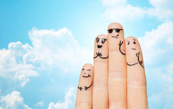 close up of four fingers family with smiley faces - Φωτογραφία, εικόνα