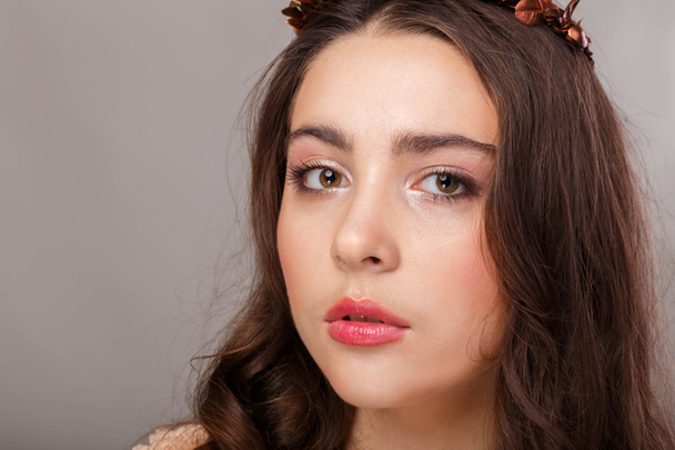 Beautiful young woman close up. Beautiful professional makeup. - Photo, Image