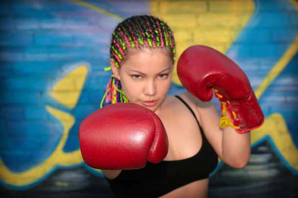 Girl with red boxing gloves - Foto, Imagen