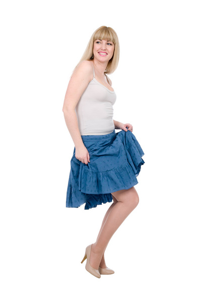 Beautiful emotional blonde in a dark blue skirt - Фото, зображення