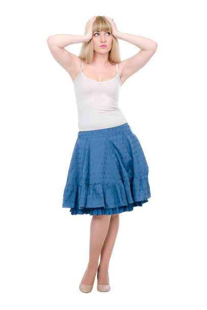 Beautiful emotional blonde in a dark blue skirt - Fotografie, Obrázek