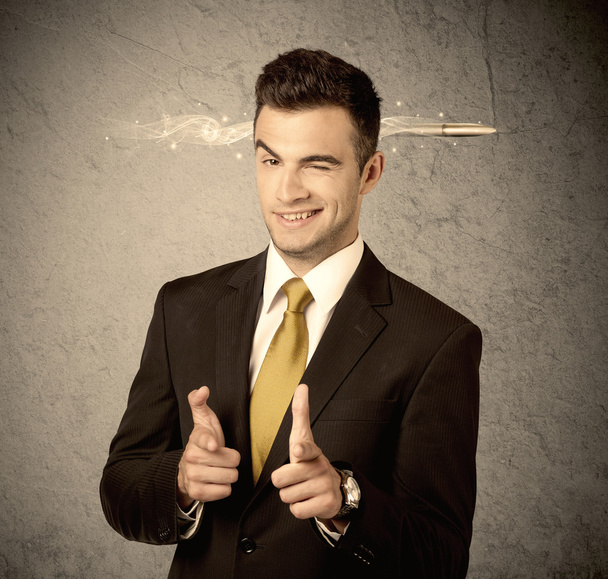 Fast creative sales guy with smoking bullet - 写真・画像