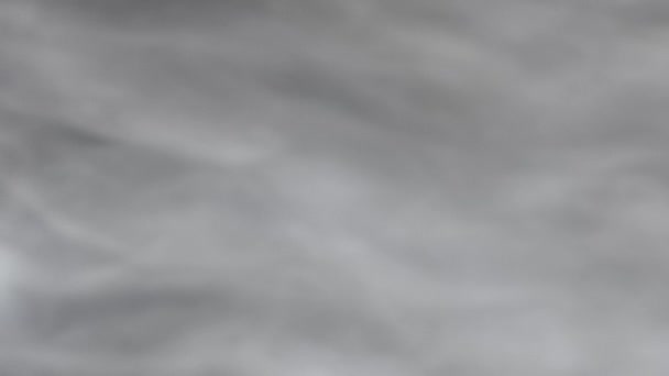 Niebla azulada flotando lentamente a través del espacio en el estudio
 - Imágenes, Vídeo