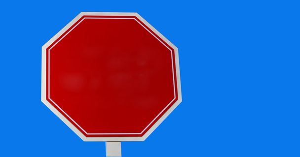 Tyhjä stop-merkki sinistä taustaa vasten
 - Valokuva, kuva