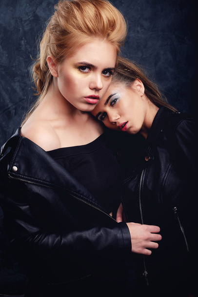 Two young girls posing together with make-up and hairstyles - Photo, Image