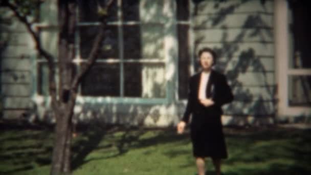 Woman walking from home - Video, Çekim