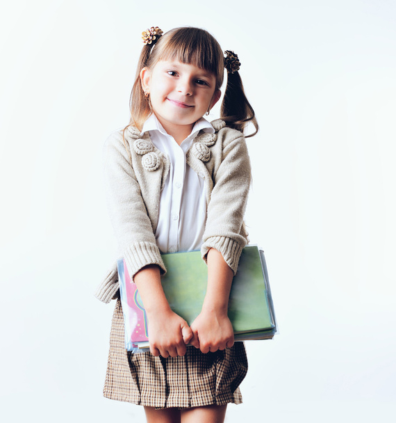 Portrait of teenager girl with school backpack holding colored f - Zdjęcie, obraz