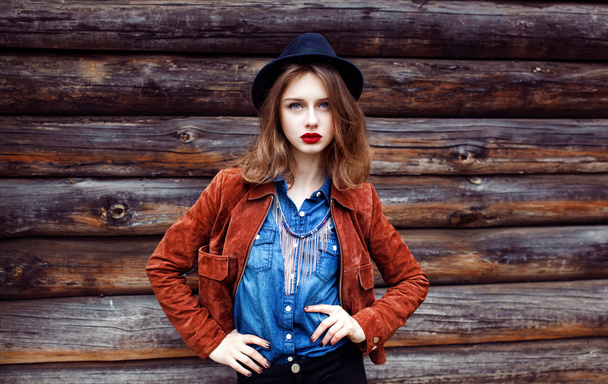 Street fashion concept. Vintage portrait of young woman in casua - Photo, Image