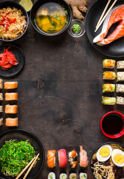 Sushi and japanese food on dark background - Photo, Image