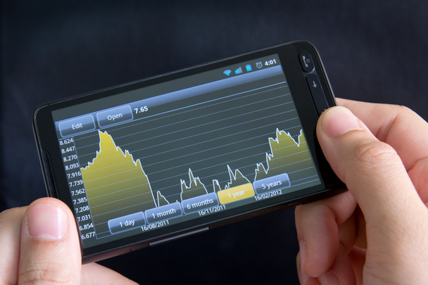 Smart phone with stock chart - Photo, Image