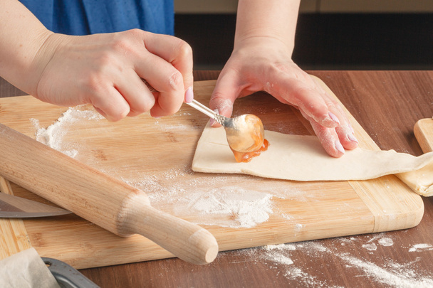 Croissants making on wood table with flour - Fotoğraf, Görsel