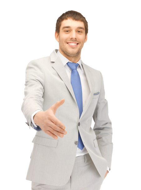 Man with an open hand ready for handshake - Photo, image