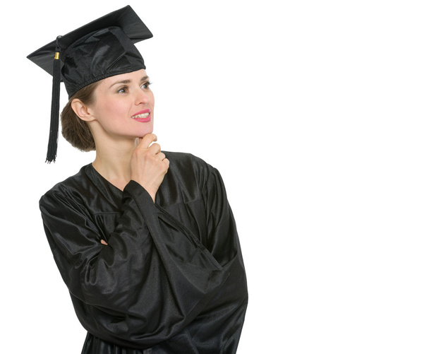 Thoughtful graduation student woman looking on copy space isolated - Фото, зображення