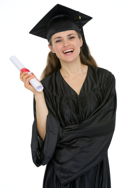 Smiling graduation female student holding diploma - Photo, Image