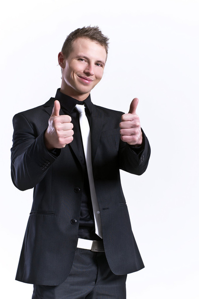 Young and beautiful man making ok sign with both hands - Photo, image