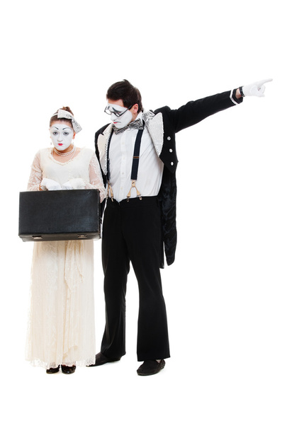 Studio shot of mimes with suitcase - Photo, Image