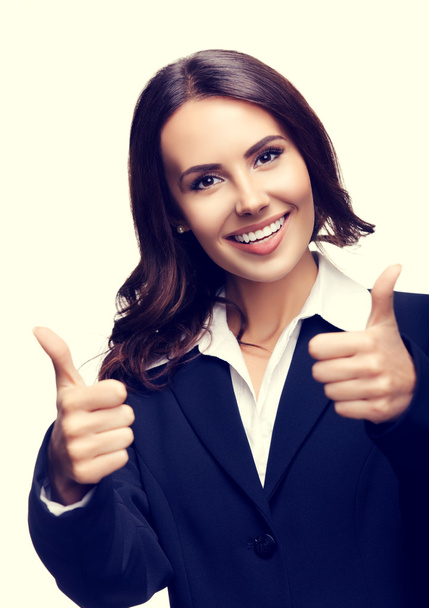 businesswoman showing thumbs up gesture - Фото, изображение