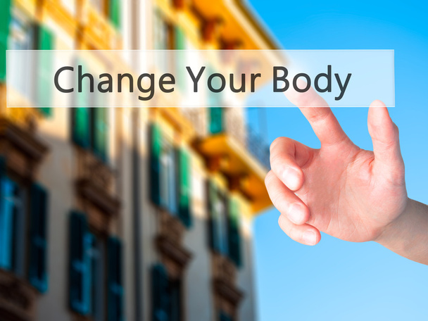 Change Your Body - Hand pressing a button on blurred background  - Фото, зображення