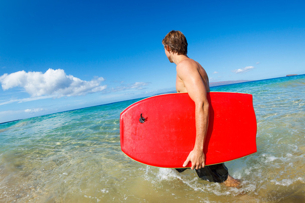 Young Man with Boogie Board at the Beach - Фото, зображення