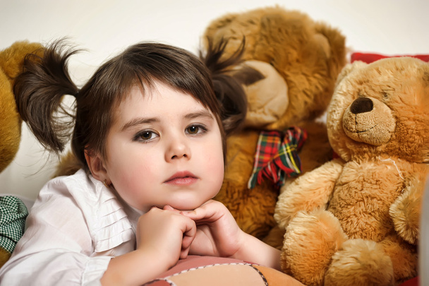 Girl with toy bear cubs - Фото, зображення