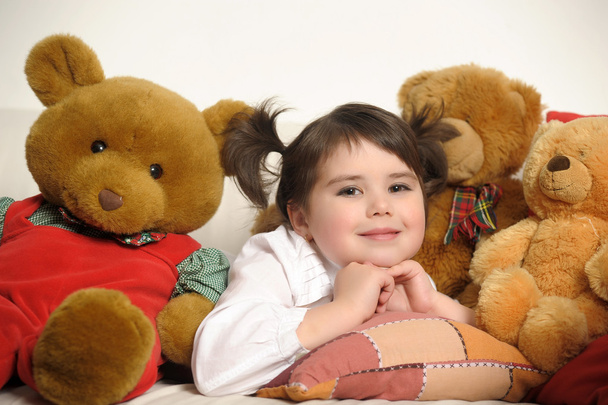 Girl with toy bear cubs - Zdjęcie, obraz