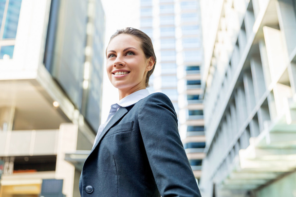 Portrait of business woman smiling outdoor - Foto, Imagem