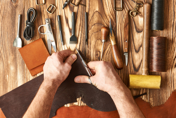 Man working with leather  - Fotografie, Obrázek