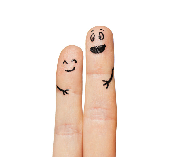 close up of two fingers with smiley faces - Фото, изображение