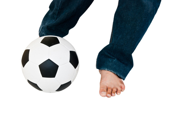 Man wear blue jeans playing football isolated on white with clipping path - Foto, immagini