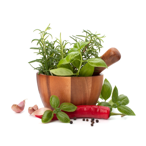 Fresh flavoring herbs and spices in wooden mortar - Photo, Image
