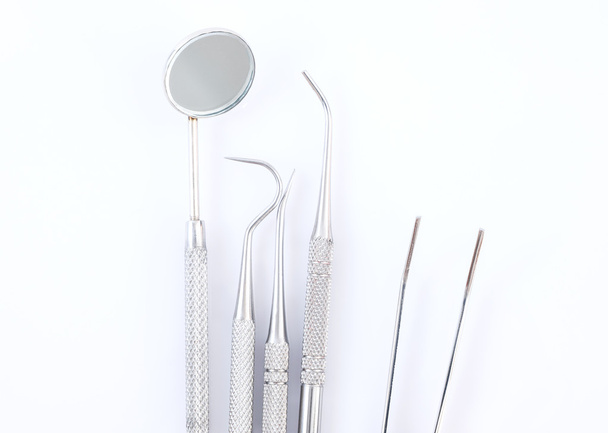 Dental tools on white background - Fotó, kép
