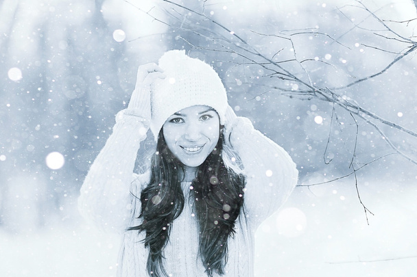 Brunette girl in snowy forest - Φωτογραφία, εικόνα