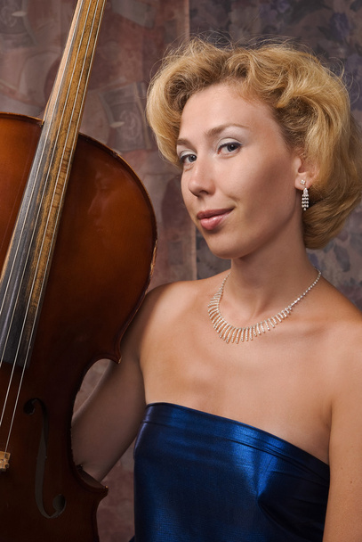 Attractive woman in evening dress with cello - Photo, Image