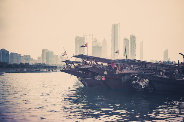 buildings skyline with fishing boats - Photo, Image