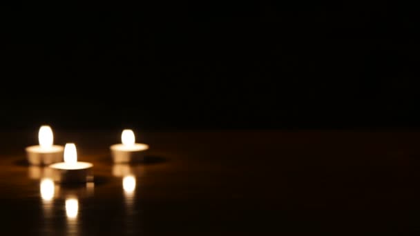 Wine glasses and burning candles. - Metraje, vídeo