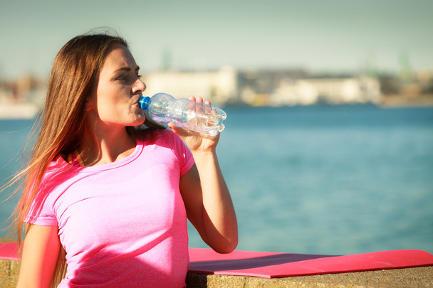 Woman with water after workout - Foto, Imagem